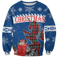 Blue Christmas sweatshirt with tartan unicorn graphic, snowflakes, and Christmas lettering