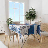 Blue holiday tablecloth with Scottish crest and diagonal white X pattern