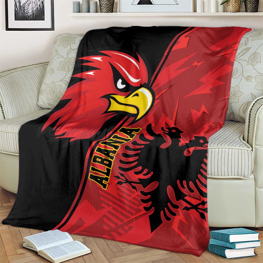 Red and black national eagle emblem grunge blanket covering armchair, books visible