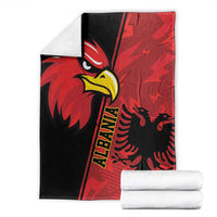Red and black eagle emblem grunge blanket with matching folded stack, front view
