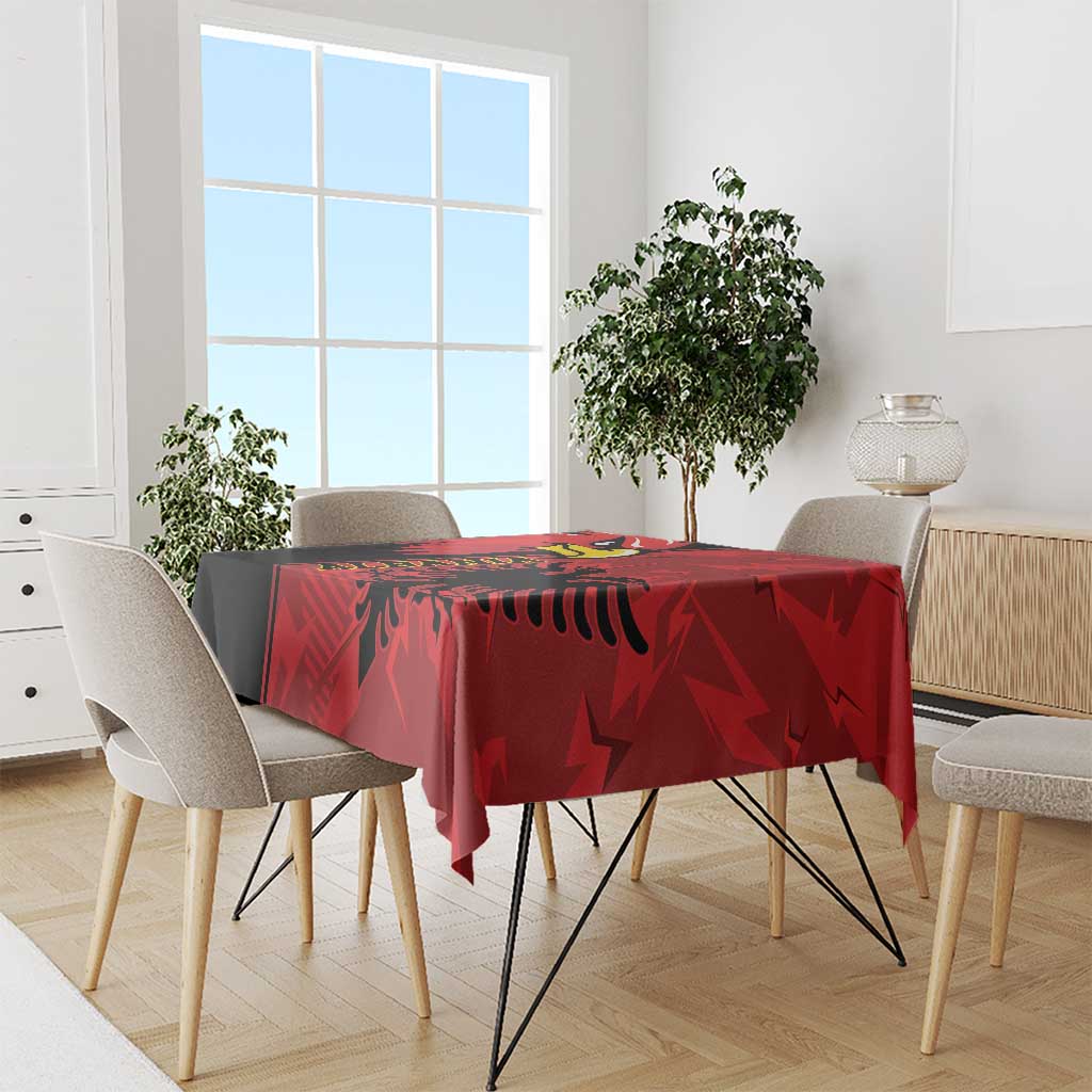 Red grunge patterned tablecloth with eagle emblem, draped over dining table
