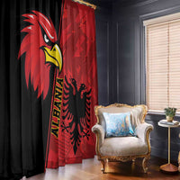 Red and black curtains with large eagle graphic, distressed backdrop, hanging folds