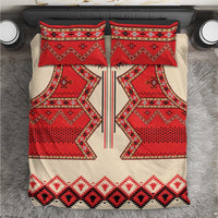 Bedding set with red, cream, and black folk geometric pattern and matching pillow shams
