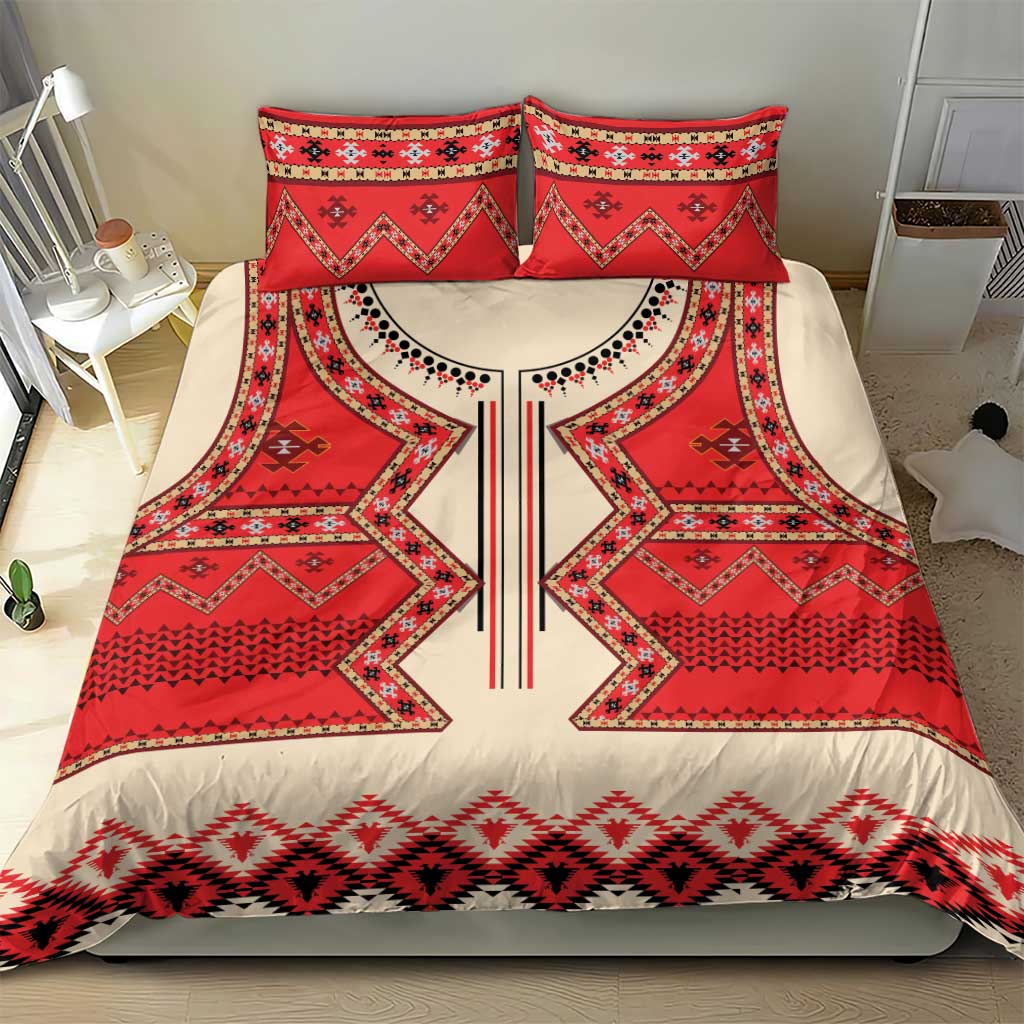Bedding set on bed with red and cream folk geometric duvet and two matching pillow shams