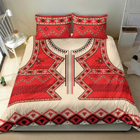 Bedding set on bed with red and cream folk geometric duvet and two matching pillow shams