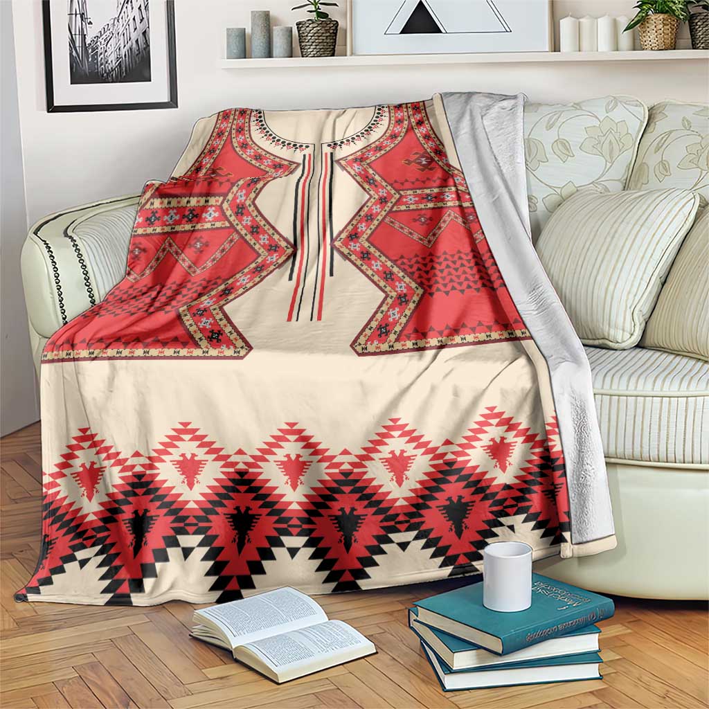Eagle-themed folk patterned blanket in red, cream, and black with fringed edge