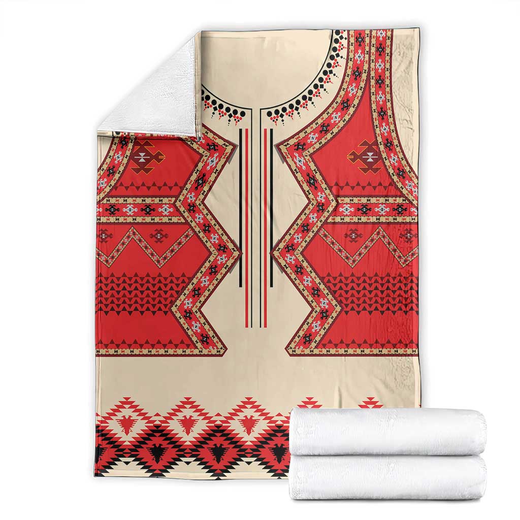 Folded folk eagle blanket in red, cream, and black with central geometric motif