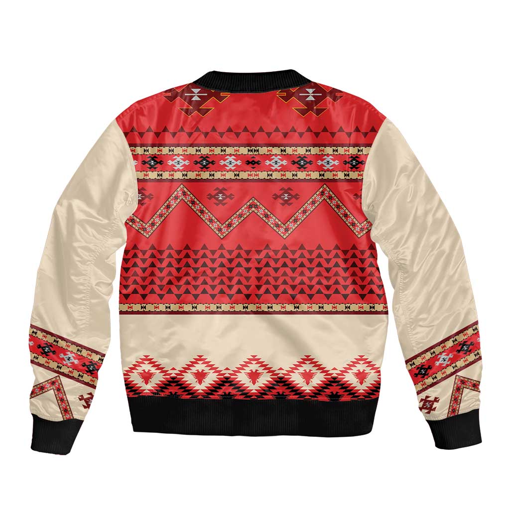 Red bomber jacket with folk geometric back panel, beige sleeves, zip front and ribbed hem