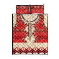 Red, cream quilt bed set with two pillowcases and geometric eagle-inspired motif