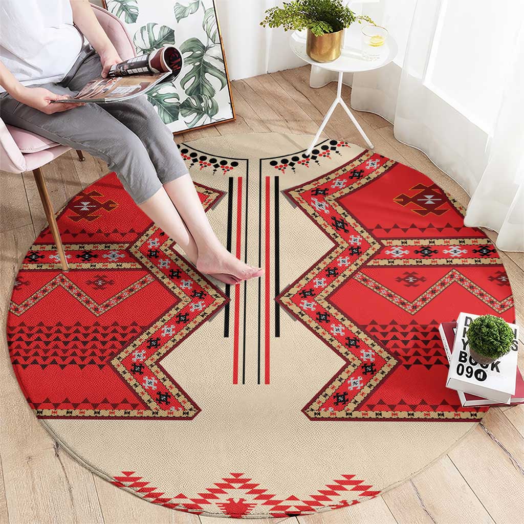 Round eagle motif carpet, beige base with red geometric panels and black stripe detail, LT18