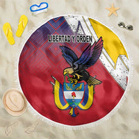 Round beach blanket with fringe, red and yellow coat-of-arms emblem with folk diamond pattern