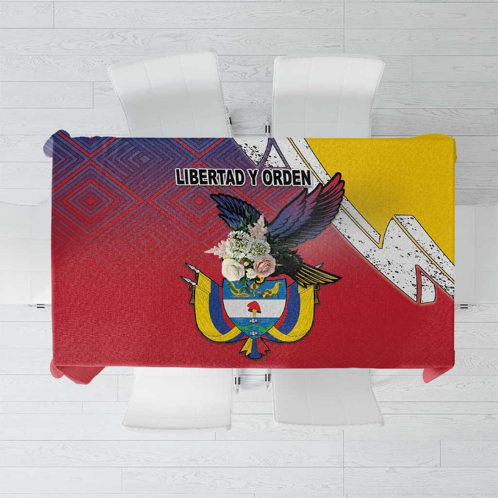 Folded red folk tablecloth with Colombian coat of arms, “LIBERTAD Y ORDEN” text, yellow panel