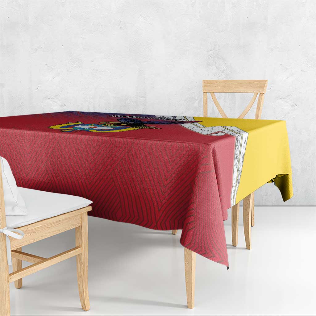 Red folk-pattern tablecloth with Colombian crest motif and yellow side border panel