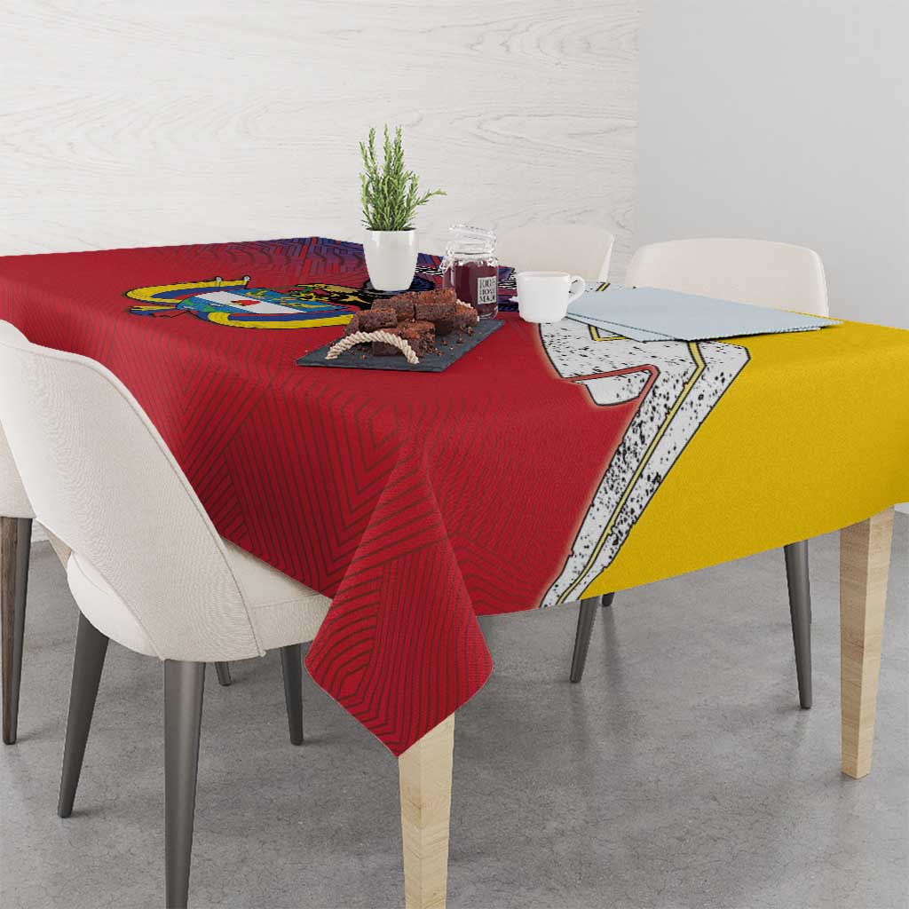 Red folk-pattern tablecloth with Colombian crest and yellow flag-style side panel