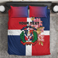 Personalized bedding set with red, white, and blue flag-style print, crest, flowers, and custom text