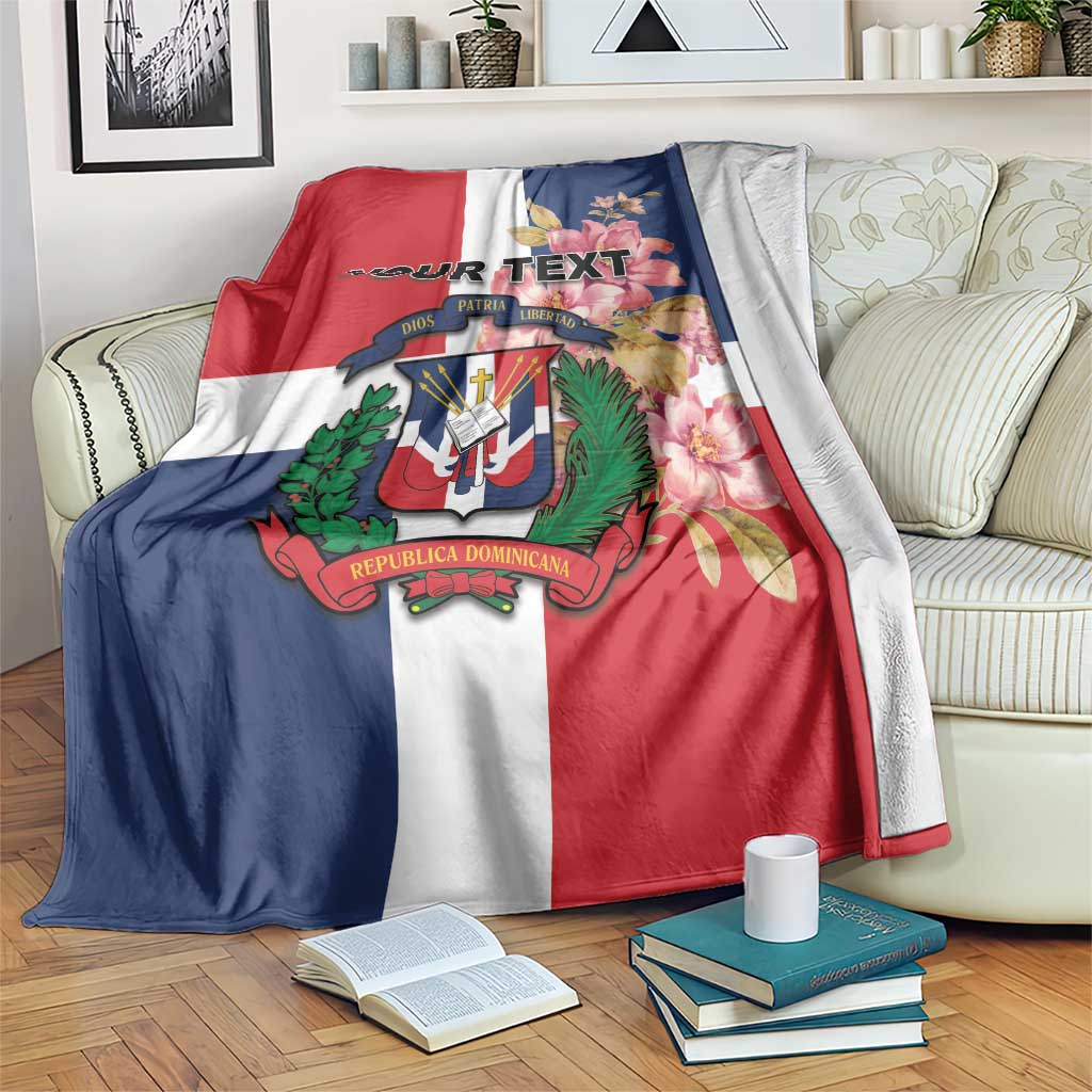Personalized flag blanket draped on sofa, red white navy panels with crest and floral