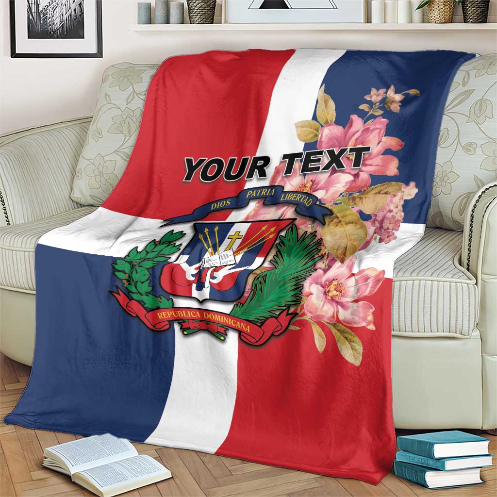 Personalized flag blanket on couch, red white navy panels with floral crest and custom text