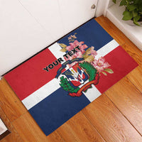 Personalized rubber doormat on floor with Dominican flag stripes, flowers, 'Your Text'