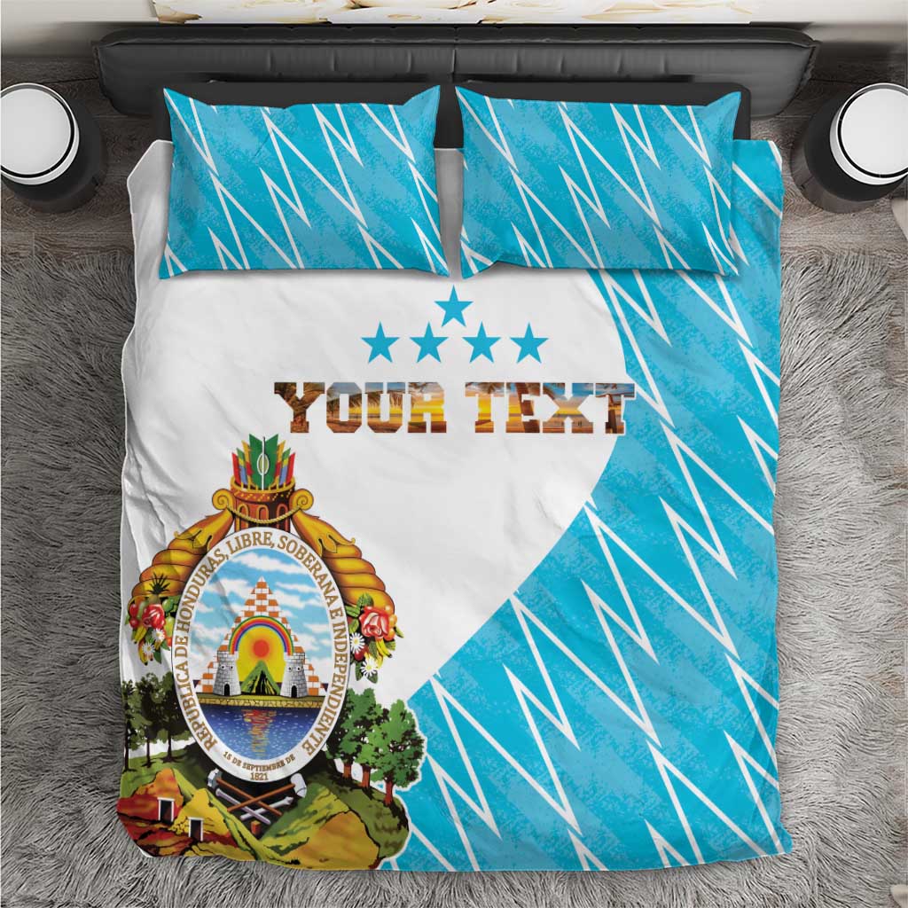 Personalized bedding set with blue geometric flag design, white panel, crest, “YOUR TEXT”