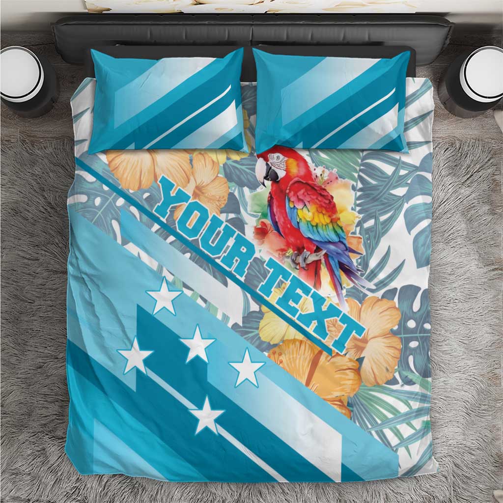 Blue bedding set with parrot and hibiscus print, star-spangled stripes, two pillowcases