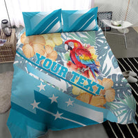 Blue duvet cover with parrot and hibiscus print, star-spangled stripes, matching pillowcases