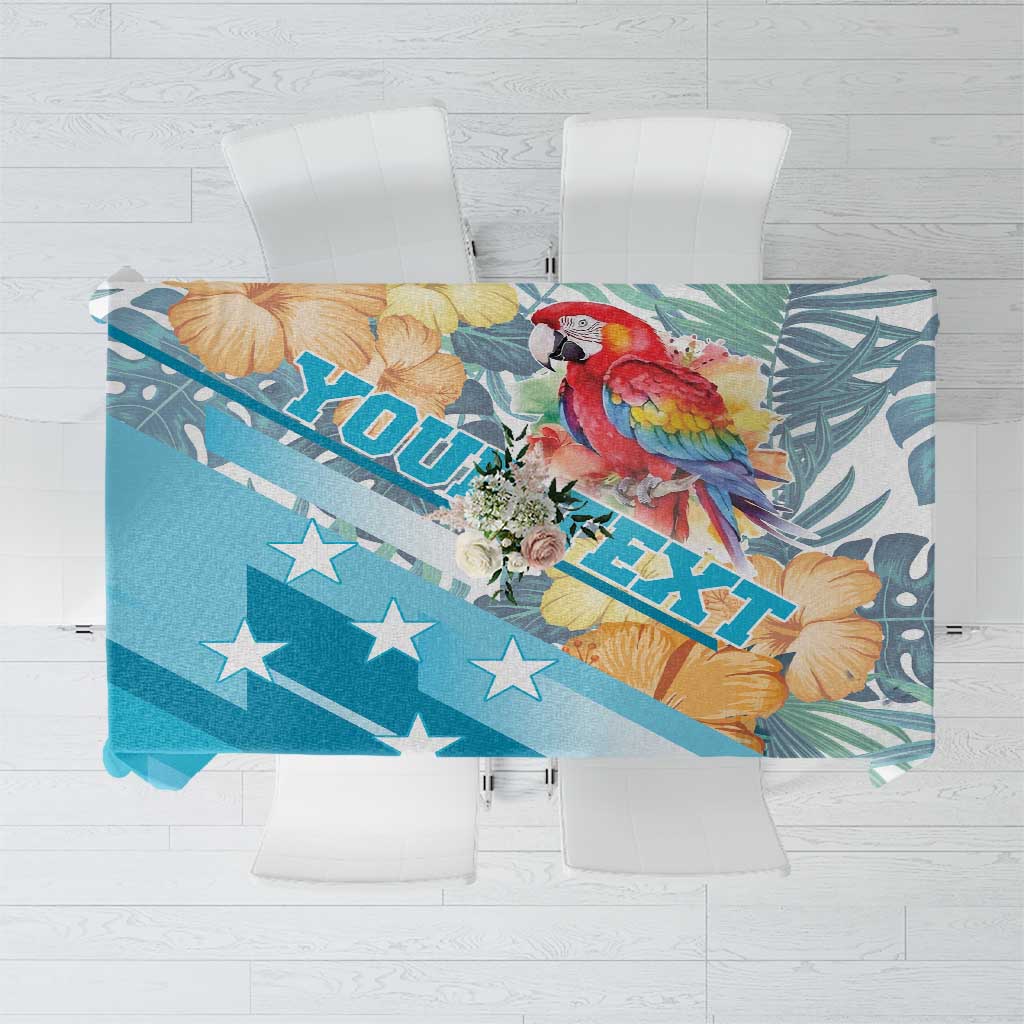 Blue tropical tablecloth with macaw and hibiscus floral print