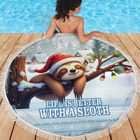 Round blue beach blanket on wooden deck with sloth illustration and fringe