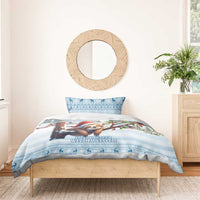 Blue sloth-themed Christmas duvet and two pillowcases with sloth in Santa hat and blue border