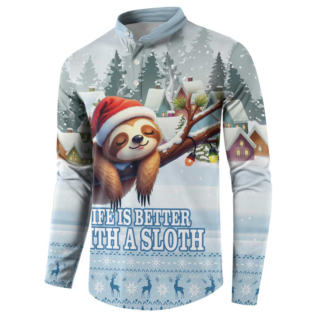 Blue button sweatshirt, front view, sloth in Santa hat with winter village print