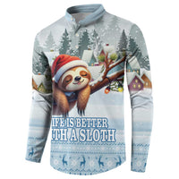 Blue button sweatshirt, front view, sloth in Santa hat with winter village print