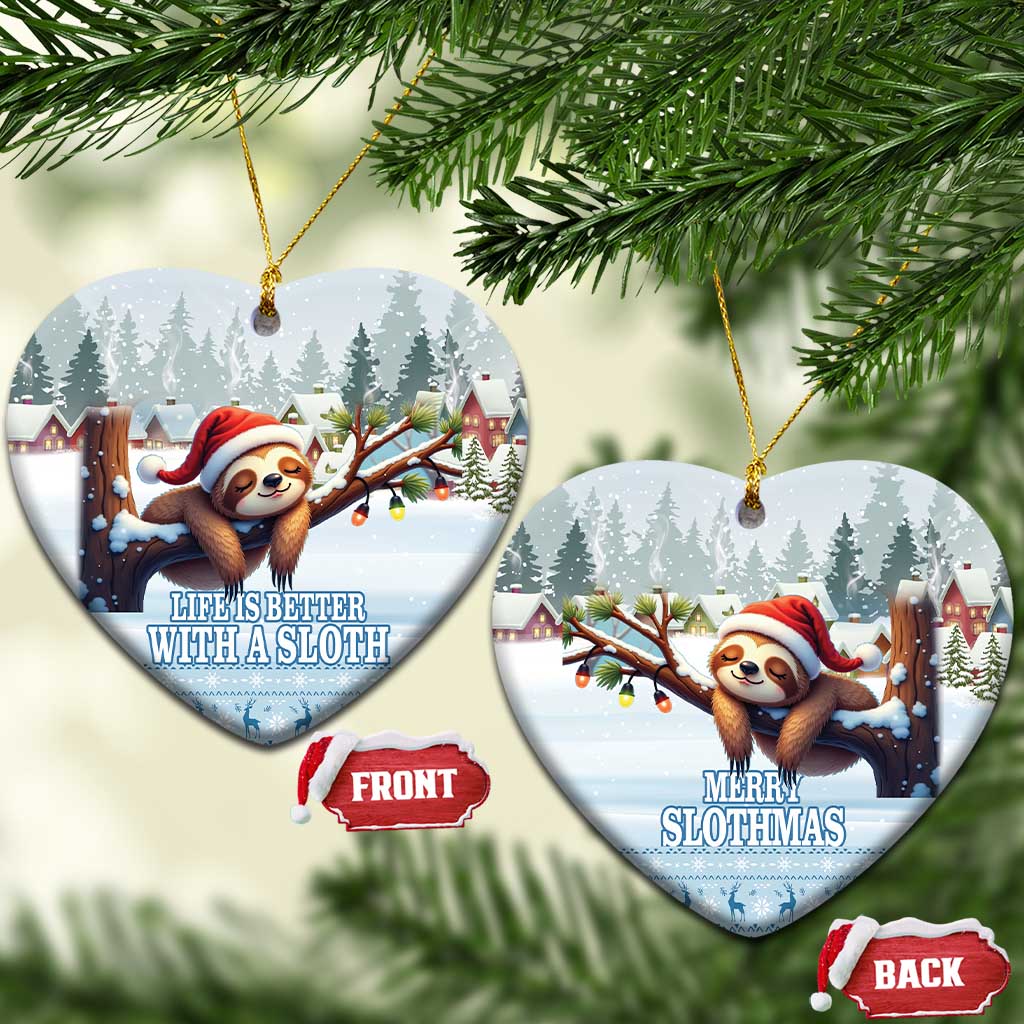 Blue ceramic heart-shaped sloth ornaments hanging, Santa sloth artwork on snowy background.