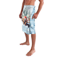 Blue patterned sarong side view with Merry Slothmas sloth graphic