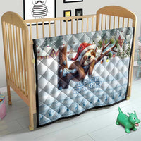 Blue quilt in child crib with sloth in Santa hat, snowy trees, and “Life Is Better” text