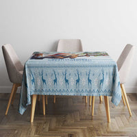 Blue winter silhouette tablecloth on dining table with chairs and straight drape