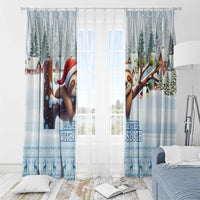 Blue winter sloth window curtains pair with sloth artwork, trees, and printed slogan