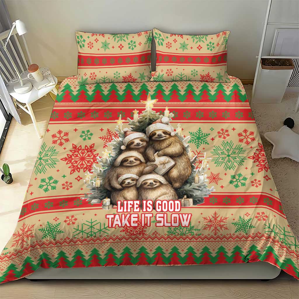 Festive sloth Christmas bedding set in red, green, and cream with bold “Life Is Good”