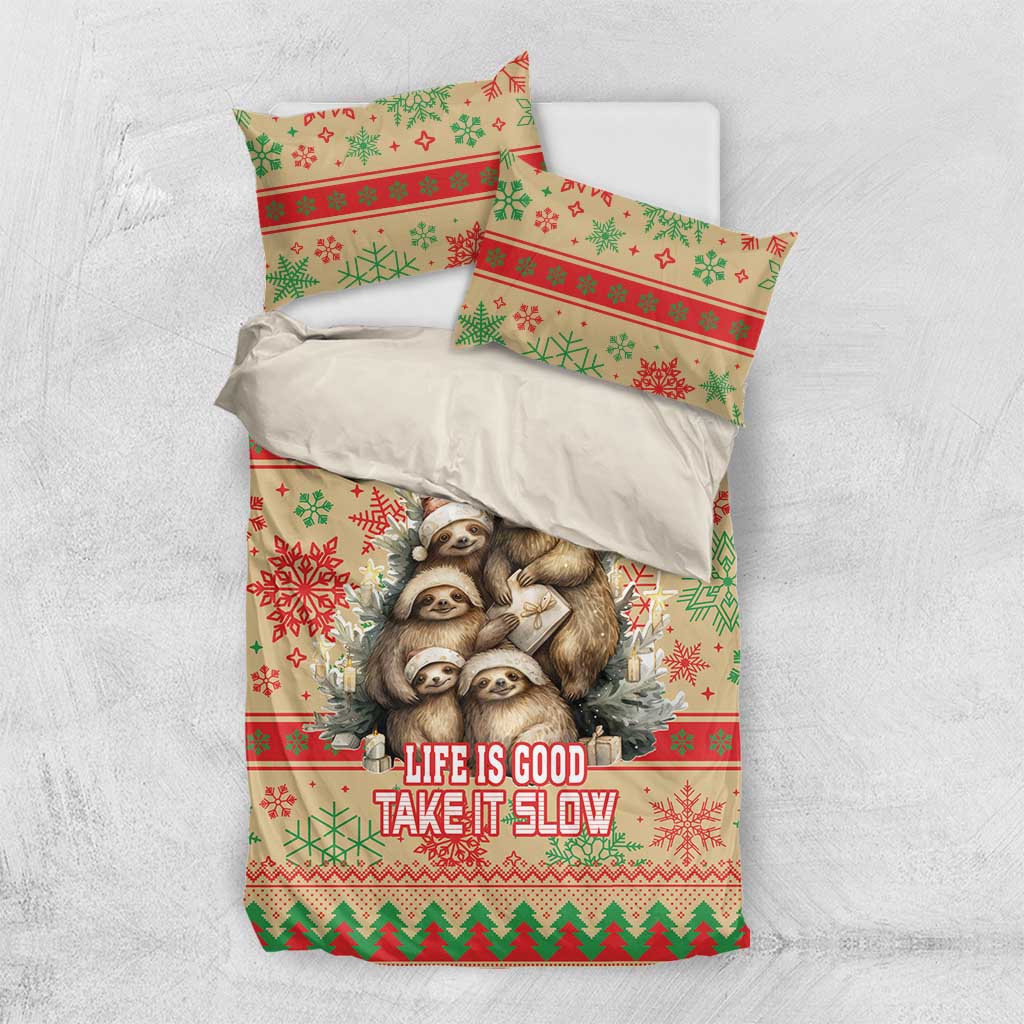 Top view of Christmas sloth bedding set with matching pillowcases and “Life Is Good” text
