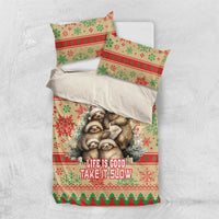 Top view of Christmas sloth bedding set with matching pillowcases and “Life Is Good” text