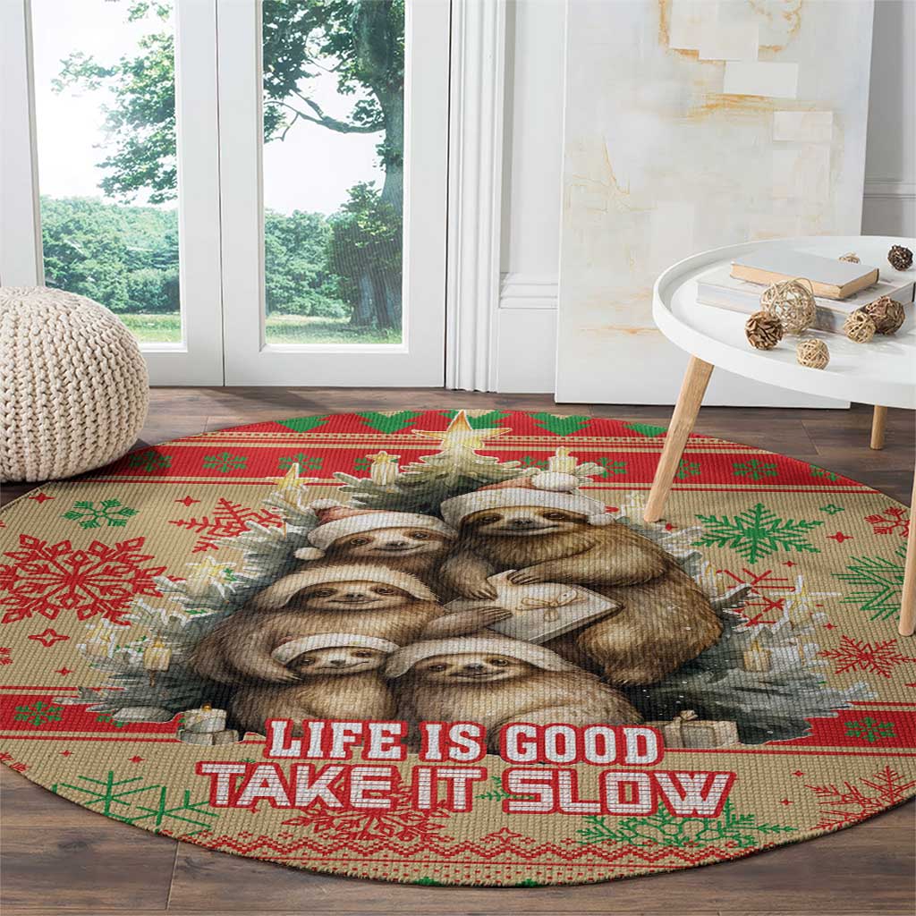 Red round Christmas rug with sloth faces centerpiece and 'Life is Good, Take It Slow'
