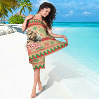 Red and green sloth print Christmas sarong with diagonal border and Life is Good text