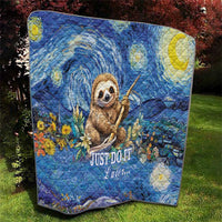 Blue sloth quilt close-up, starry floral design with sloth and "Just Do It Later..."
