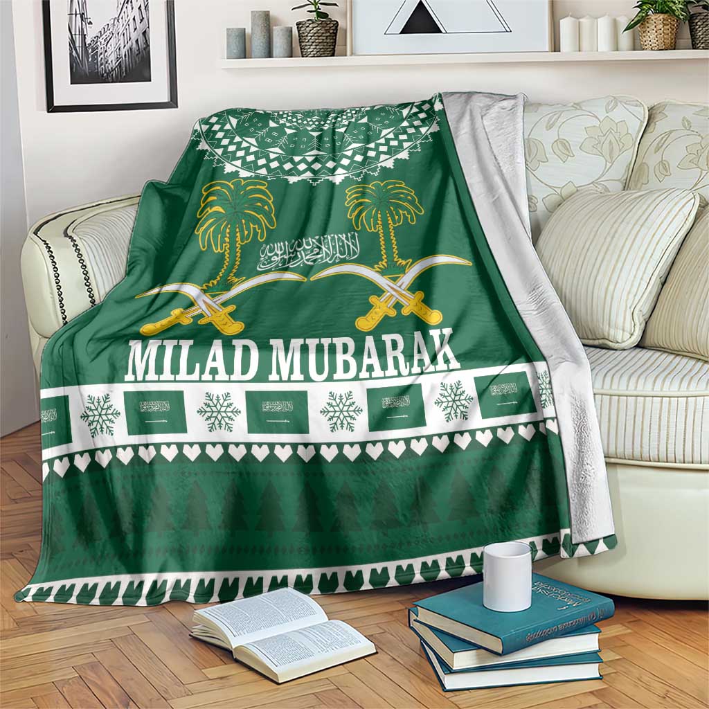Green Christmas throw blanket with white patterned border and gold palm tree design