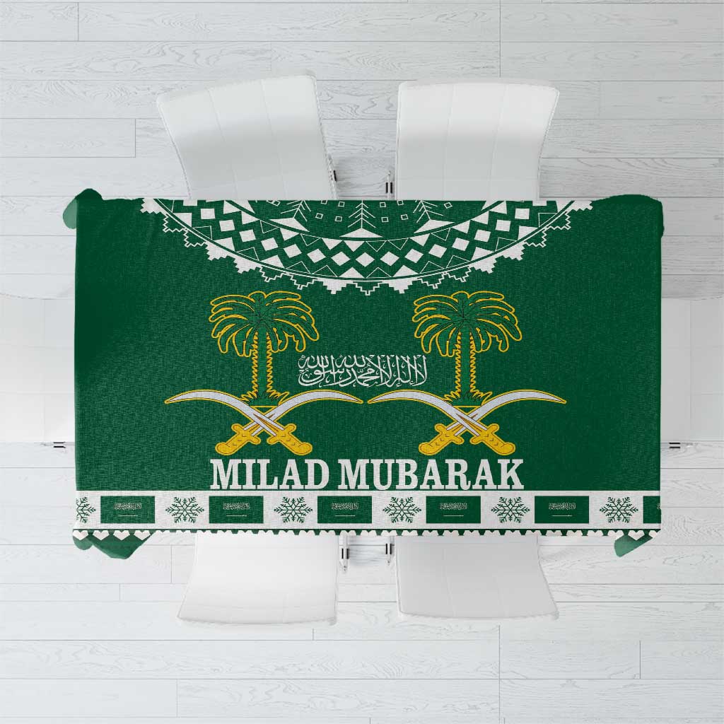 Green Christmas tablecloth with gold palms, crossed swords, and “MILAD MUBARAK” design