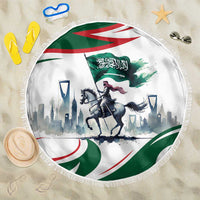 Round horse rider beach blanket with fringed edge, green-and-white flag design on sand