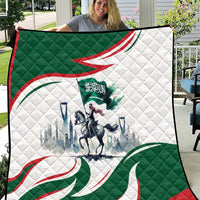 Green and white quilt with red swirl accents, quilted pattern, and horse rider print