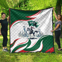 Green and white quilt with red-and-green wave design and central horse rider graphic