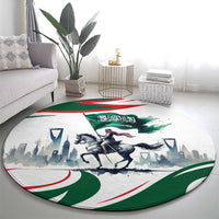 Round green, white and red area rug with horse rider graphic and Arabic calligraphy