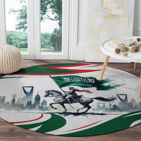 Round decorative rug with horse rider illustration, green emblem, and Arabic text