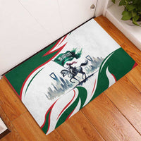 Green rubber doormat with illustrated horse rider and Saudi flag colors