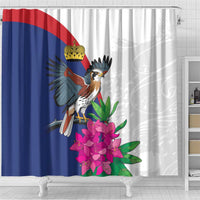Blue-and-white shower curtain with crowned bird artwork and pink flower bouquet